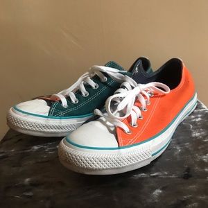 Two tone orange and teal converse sneakers